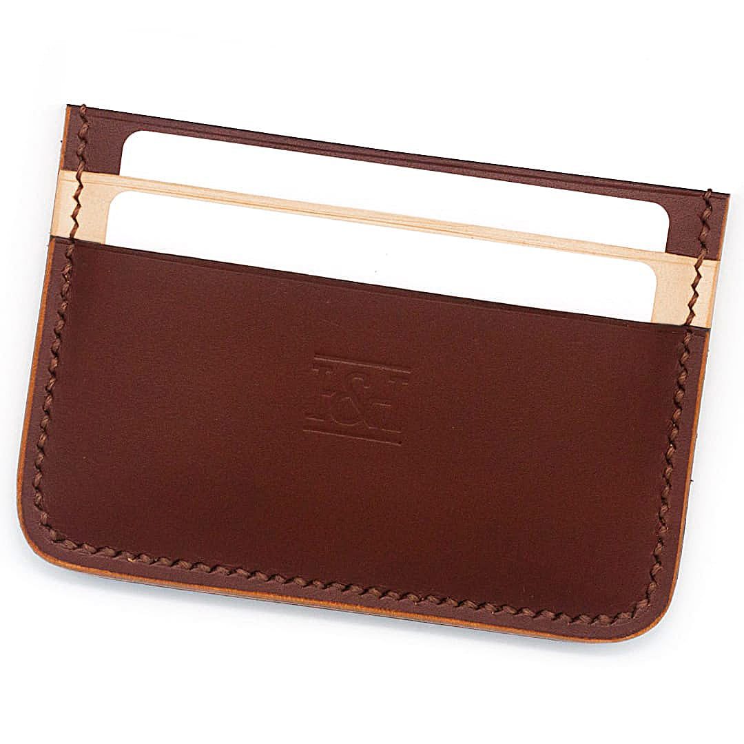 4 slot leather cardholder with classic slots and cards.