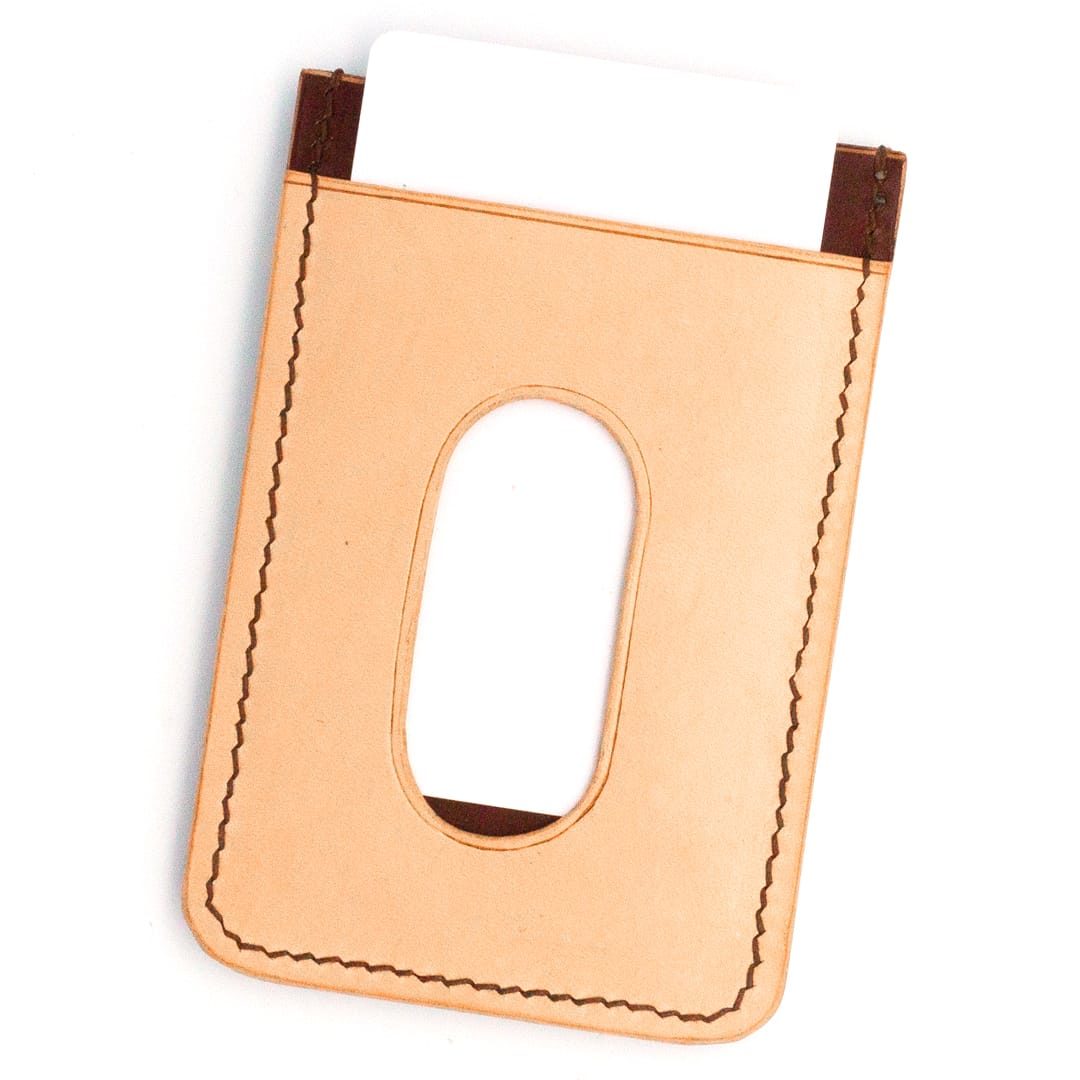 Vertical cardholder with contrasting brown and nude quick slot pocket and blank card.