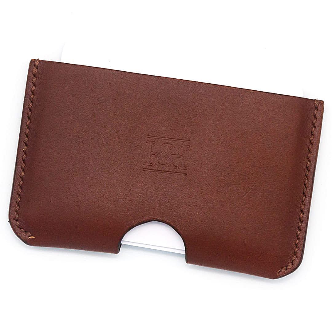 Folded single slot cardholder with cards