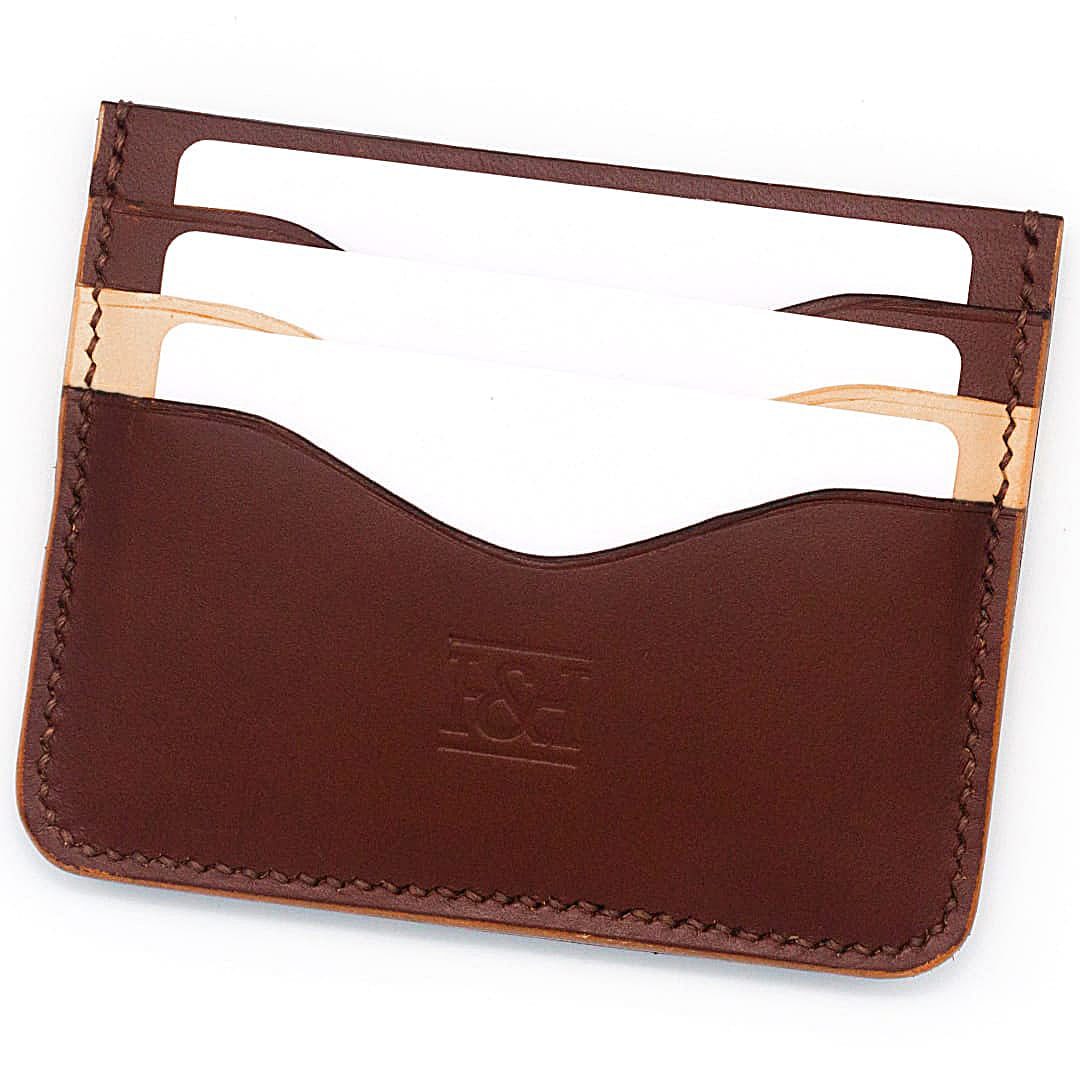 6 slot leather cardholder with wavey slots and cards.